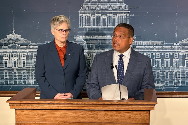 Minnesota Attorney General Keith Ellison (right) speaks during a news conference as Hennepin County Attorney Mary Moriarty looks on, Tuesday, Aug. 18, 2026, in St. Paul, Minn.