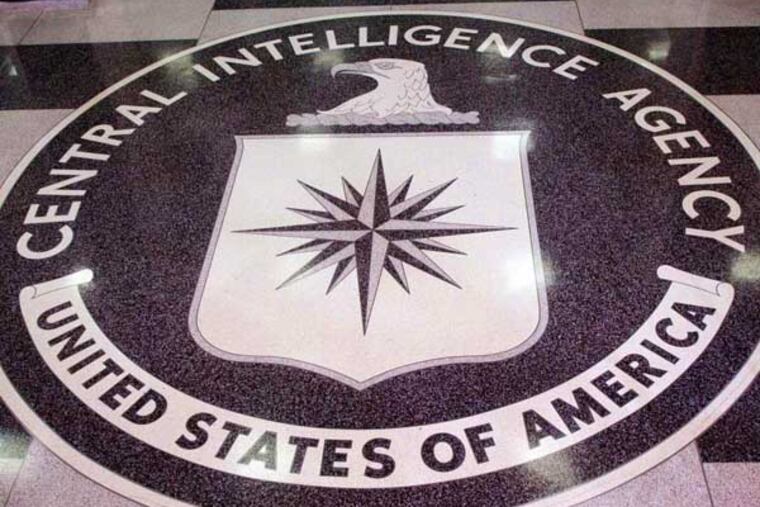 The seal of the Central Intelligence Agency, on the floor of the foyer at the CIA Headquarters, in Langley, VA is shown in a photo taken Thursday, March 3, 2005. Photographer: Dennis Brack/Bloomberg News