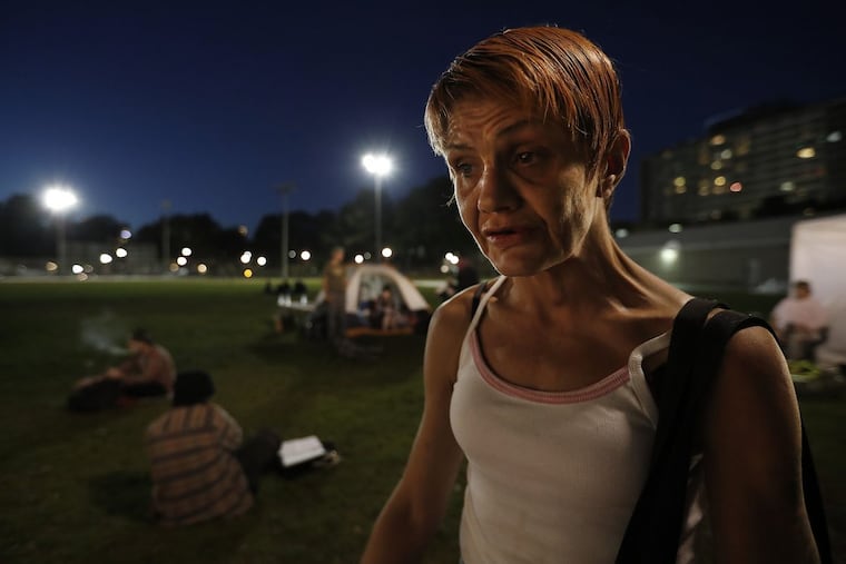 Angie Austin, who uses heroin, visits the pop-up safe injection site at Moss Park in Toronto.