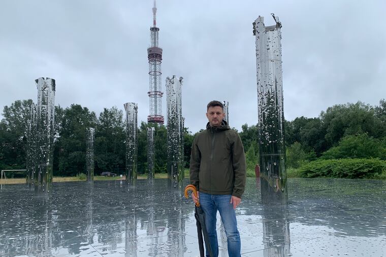 Ruslan Kavatsyuk, former deputy CEO of the Babyn Yar Holocaust Memorial Center in Kyiv, at an installation made of mirrors which was constructed to honor the memory of 100,000 victims of the Nazis who were killed nearby.