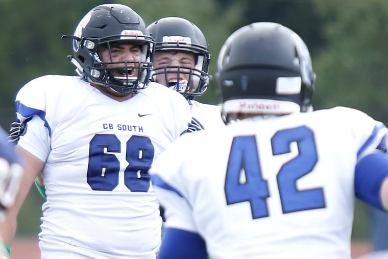 Central Bucks South senior defensive tackle Noah Collachi (68) celebrates his fourth-quarter sack in Saturday’s 37-28 victory over Suburban One League Continental Conference rival Central Bucks East.