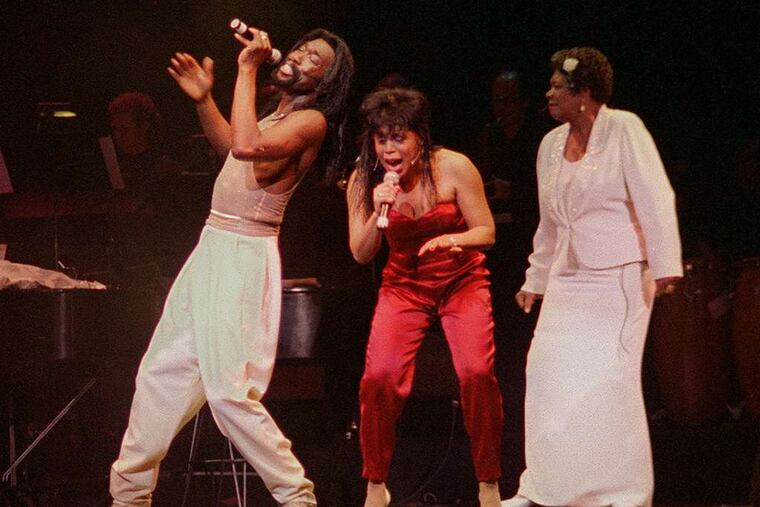 Ashford and Simpson perform with poet laureate Maya Angelou (right) in a 1996 Valentine's Day concert. Although the duo sang together, "songwriting is the cornerstone of everything else we did," Simpson says. "That's the hat we were most proud of wearing as a couple."