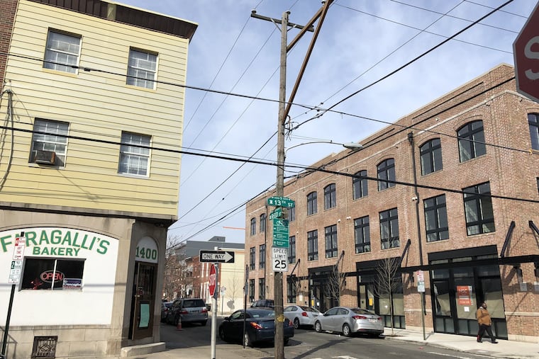 The new Exile building at 13th and Reed looks as if it had always been part of the neighborhood.