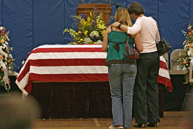 Family, friends and classmates attended the memorial service of Kristen Marie Dickmann, a Naval Academy freshman and star athlete who died mysteriously.
