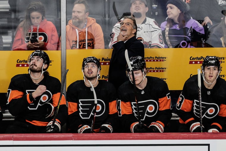 Flyers coach John Tortorella looks up at the scoreboard during the game against the Florida Panthers on Thursday at the Wells Fargo Center.