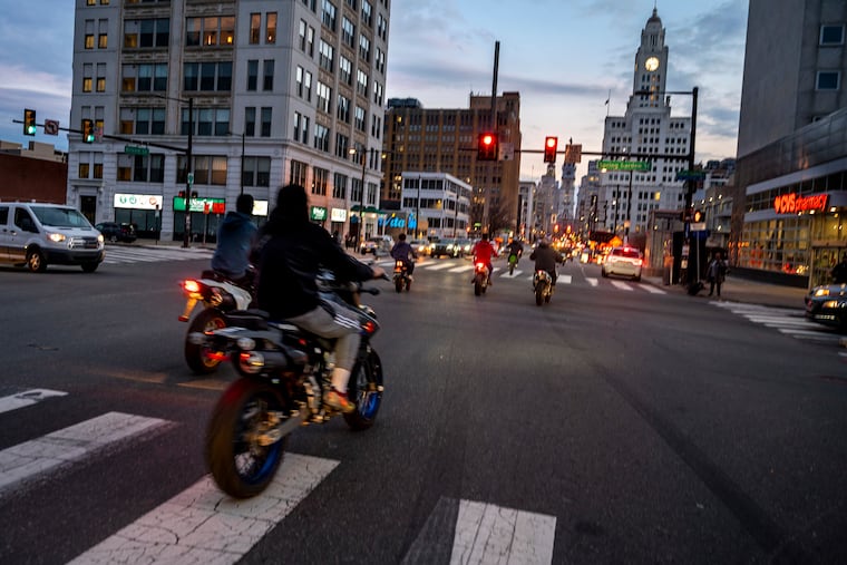 The intersection of Broad and Spring Garden Streets, and the new Philadelphia Public Services Building and Police Department Headquarters (rear, right).