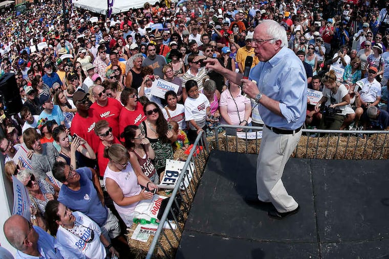 Bernie Sanders, shown at a 2019 rally, has drawn supporters with a populist message that emphasizes affordable health care. But Joe Biden and President Trump also talk about the problem, which has only escalated in recent years.