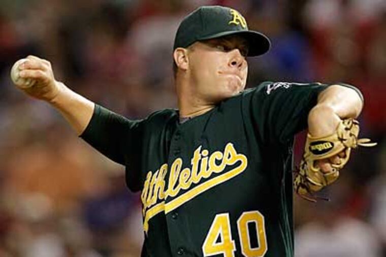Andrew Bailey got the save for the Athletics in his first game at Citizens Bank Park. (Tony Gutierrez/AP)
