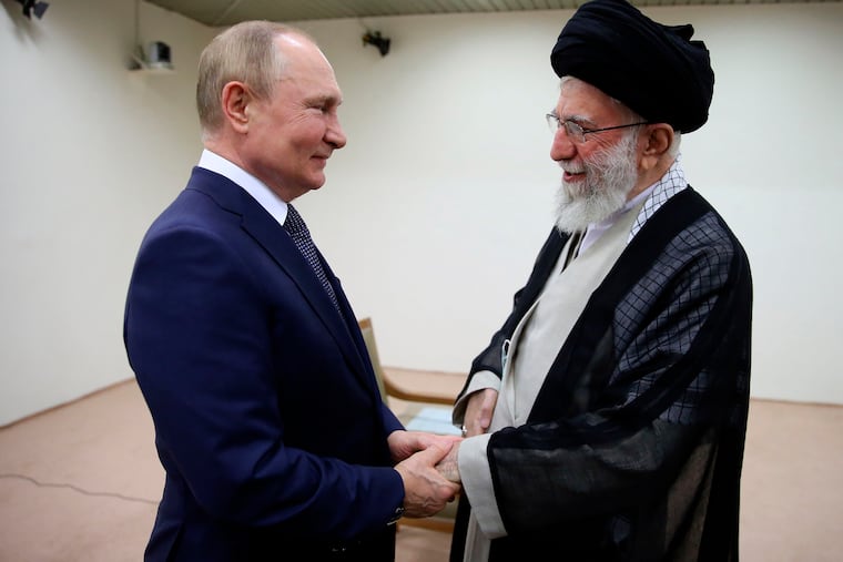 Supreme Leader Ayatollah Ali Khamenei and Russian President Vladimir Putin greet each other during their meeting in Tehran, Iran, on July 19, 2022.