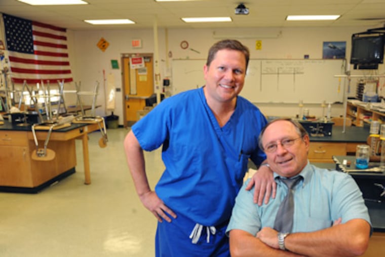 Medford science teacher Al Siedlecki inspired Lee Buono to become a doctor. Last month, Siedlecki was honored at the White House for his impassioned teaching. (Clem Murray / Staff Photographer)