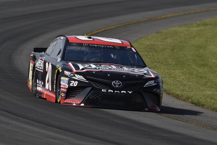Erik Jones drives through Turn 3 during qualifying for Sunday's NASCAR Cup Series auto race, Saturday, July 28, 2018, in Long Pond, Pa. (AP Photo/Derik Hamilton)