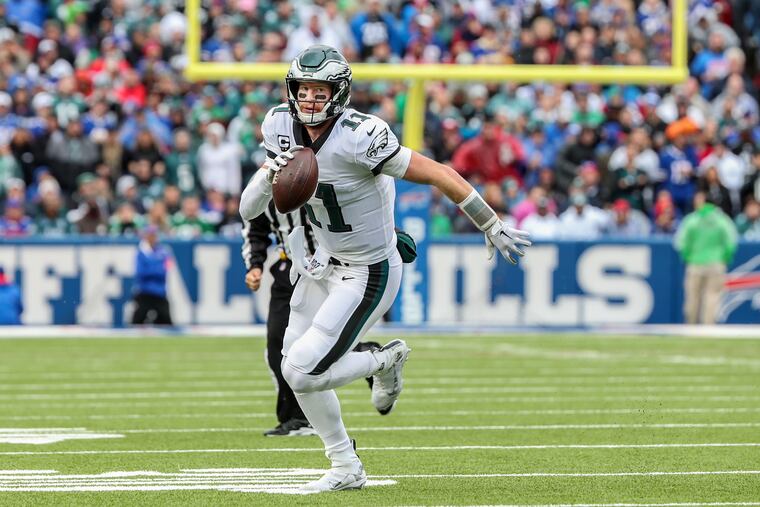 Eagles quarterback Carson Wentz scrambles for a first down in the game against the Buffalo Bills at New Era Stadium on October 27, 2019.