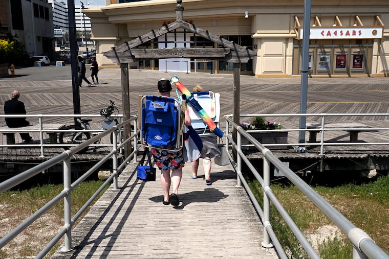 Heading off the beach toward the boardwalk at Missouri Ave. in Atlantic City May 2, 2024. ( Jersey Shore )