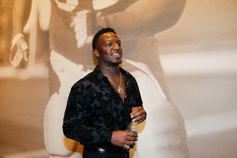 The necklace Jordan Howard wears features a photo of his parents.