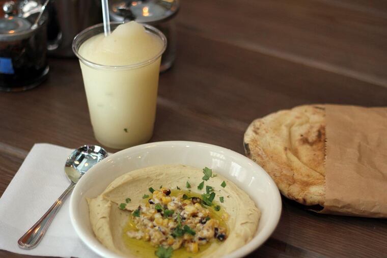 Hummus with corn, with pita and lemmonana, at Dizengoff.