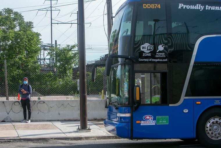 Leon Dion waits for the Megabus to arrive. Megabus resumes service from JFK just west of 30th St Station on Monday, June 1, 2020. Service had been halted because of the spike in coronavirus cases.