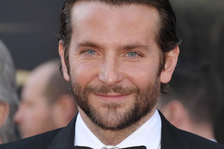 Actor Bradley Cooper arrives at the Oscars at the Dolby Theatre on Sunday Feb. 24, 2013, in Los Angeles. (Photo by John Shearer/Invision/AP)