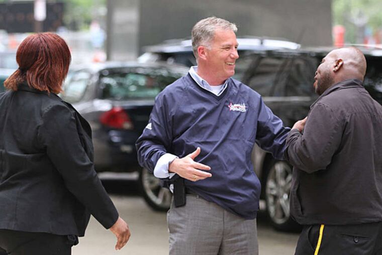 City Council candidate Ed Neilson (center) talks with Vernice Bradley and Derrick Canady in front of City Hall. MICHAEL BRYANT / Staff Photographer