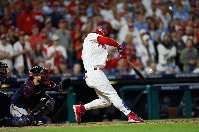 Bryce Harper hits a solo home run in the fifth inning in Game 3.