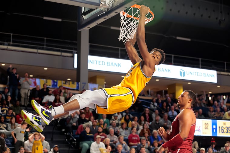 Drexel's Amari Williams, seen here in action against Temple, scored a game-high 14 points and 11 rebounds in a win over Albany on Saturday.