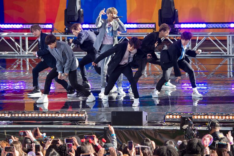 FiLE - In this May 15, 2019, file photo, South Korean boy band BTS perform on ABC's "Good Morning America at Rumsey Playfield/SummerStage in Central Park, in New York. The agency for K-pop superstars BTS says the singers will take an extended break from showbiz to rest and relax and “enjoy the ordinary lives of young people in their 20s, albeit briefly.” Big Hit Entertainment said a concert on Monday, Aug. 12, 2019, in Seoul was group’s last scheduled event before the seven members go on “vacations” for the first time since their 2013 debut. (Photo by Scott Roth/Invision/AP, File)