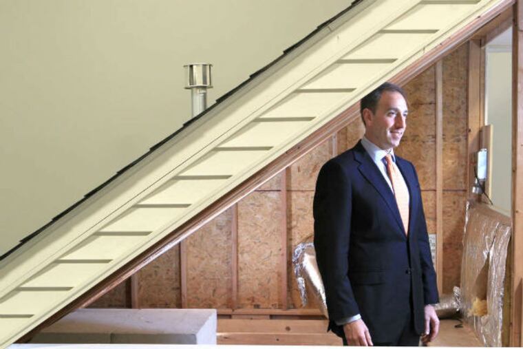 Jeff Bartos, CEO of the Mark Group's U.S. operations, stands in an attic training area in the office at the Philadelphia Navy Yard. Due to the changing market, after 3 years the company employs 175 in the U.S. (Charles Fox / Staff Photographer)