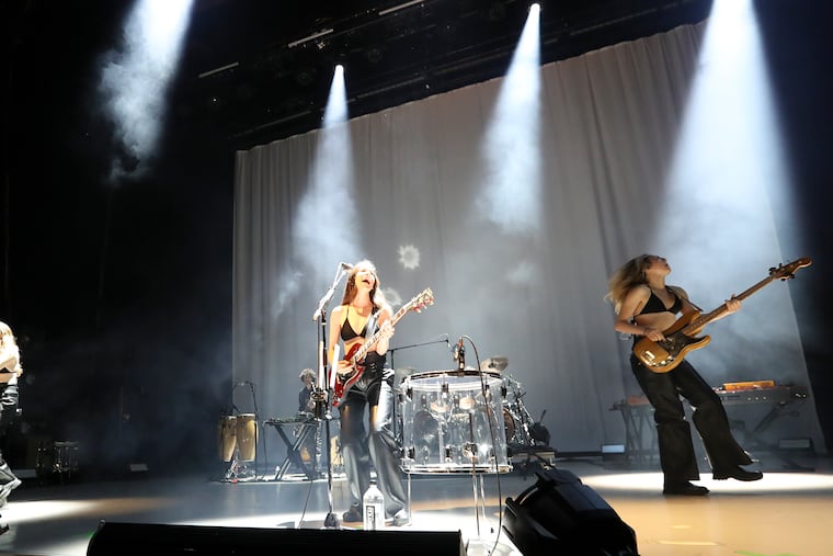 Haim performs during the One More Haim tour at the Mann Center on Saturday.