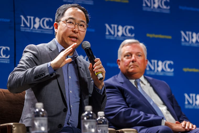 Sen, Andy Kim (left) on stage with Neil Bradley, executive vice president and chief policy officer for the U.S. Chamber of Commerce, at Tuesday's summit for business leaders in Atlantic City.