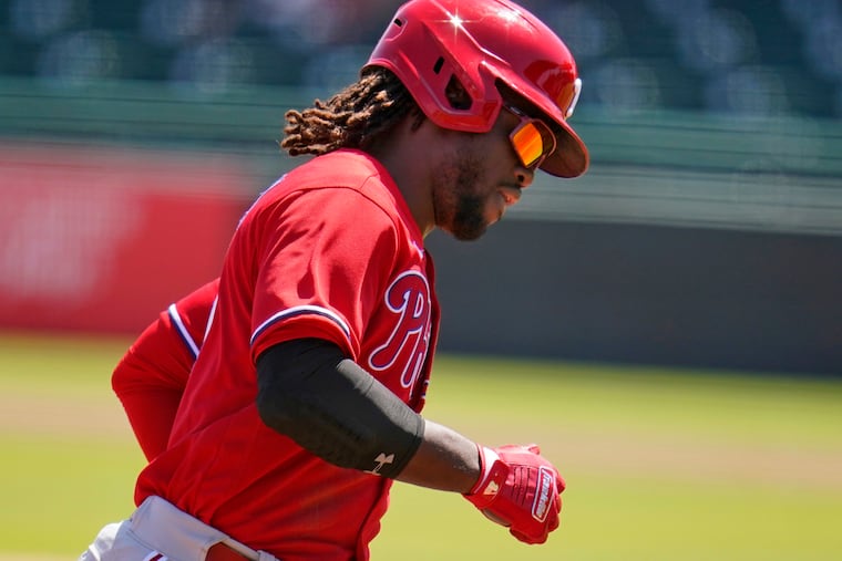 Phillies center field candidate Odúbel Herrera rounds the bases after homering off Pittsburgh Pirates lefty Steven Brault in the third inning Sunday in Bradenton, Fla.