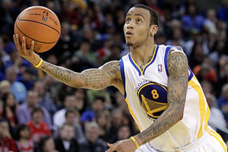 New Warriors coach Mark Jackson wants Monta Ellis to remain with Golden State. (Ben Margot/AP file photo)