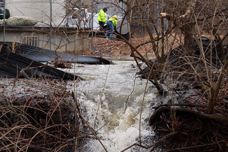 Excess wastewater is released into Valley Creek on Wednesday March 19, 2014. ( DAVID SWANSON / Staff Photographer )