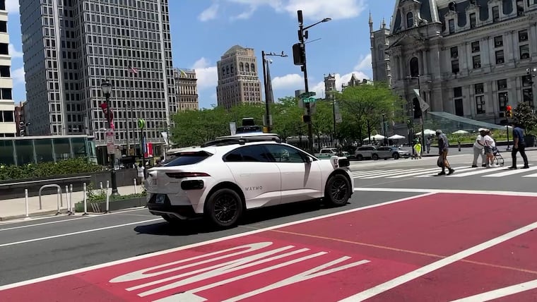 A Waymo driverless car heads down Market Street on Tuesday, July 8, 2025, in Philadelphia.
