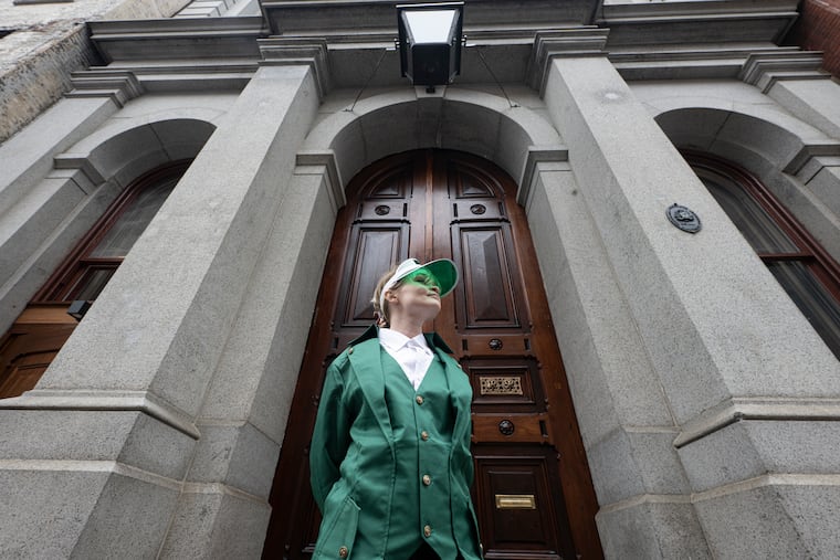 Sullivan Vaughan welcomes visitors at the entrance to the Ministry of Awe on Thursday, March 5, 2026, in Old City in Philadelphia. The building is a new, immersive art experience created by visionary artist Meg Saligman alongside more than 100 Philadelphia-based artists.