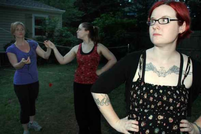 Rehearsing "Empress of the Moon" are (from left) Jennifer Ann Hutten , JaQuinley Kerr, and Casey Conan. The play is being staged by the experimental wing of Iron Age Theatre at the Adrienne Theatre. The writer and director is Chris Braak.