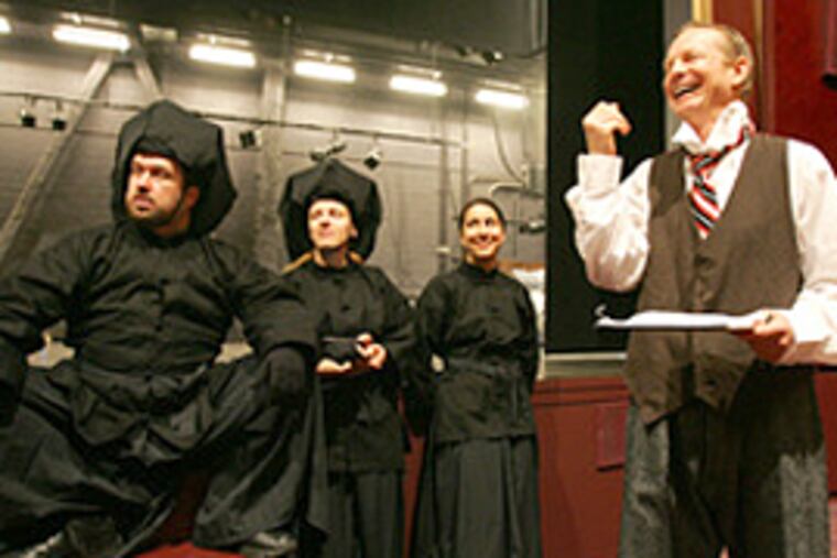 Actor Bill Irwin laughs during rehearsal with (from left) Aaron Cromie, Dawn Falato and Nichole Canuso. The Tony Award winner is in Philadelphia performing in “The Happiness Lecture” for the Philadelphia Theatre Company. (David Swanson/Inquirer)