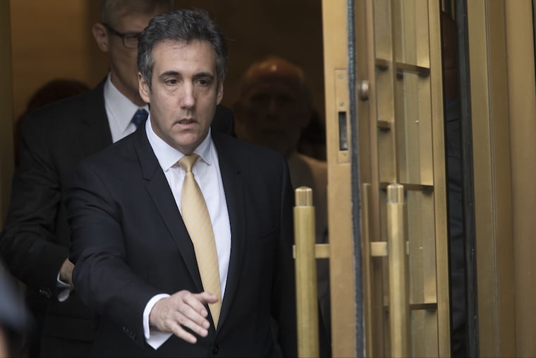 Michael Cohen leaves Federal court, Tuesday, Aug. 21, 2018, in New York. Cohen, has pleaded guilty to charges including campaign finance fraud stemming from hush money payments to porn actress Stormy Daniels and ex-Playboy model Karen McDougal.