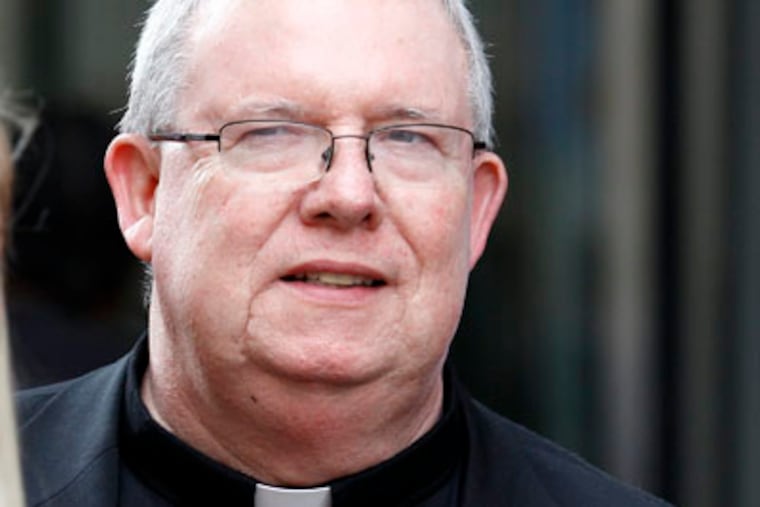 Msgr. William J. Lynn leaves the Criminal Justice Center after testifying in clergy sex-abuse trial on Wednesday, May 23, 2012. ( Yong Kim / Staff Photographer )