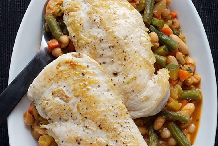 Chicken with a vegetable ragout. (DEB LINDSEY / Washington Post)