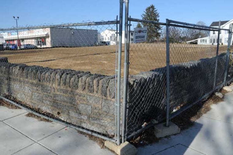 Various Scenes of the Bunting House: All that is left of the Bunting House at the northeast corner of Ridge and Roxborough Aves is the stone wall that surrounded the house. Ridge Ave to the left and Roxborough to the right. A Wendy's is proposed for the site. ( CLEM MURRAY / Staff Photographer )