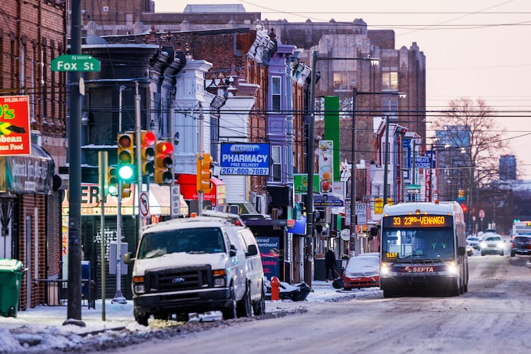 The 33 bus SEPTA makes it way north on 22nd Street business corridor near Fox Street on Monday.