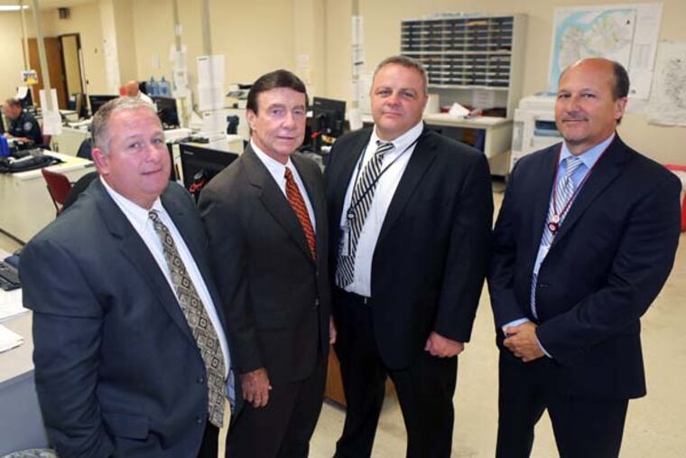 Left to right, Detectives Bob Chew, Marty Devlin, Shawn Donlon and Joseph Forte at the Camden County Police Headquarters in Camden, NJ on Thursday, July 10, 2014. (Stephanie Aaronson/Philly.com)