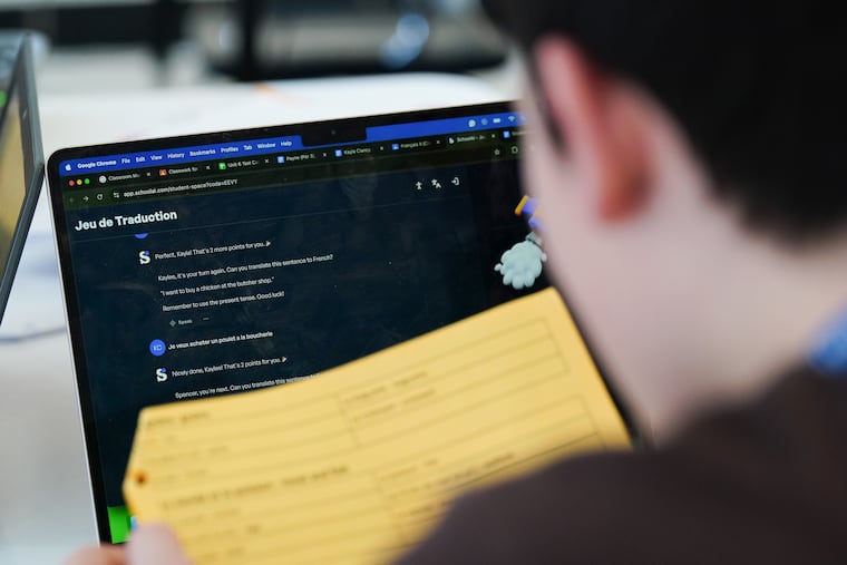 A student chats with an AI program in French class in March.