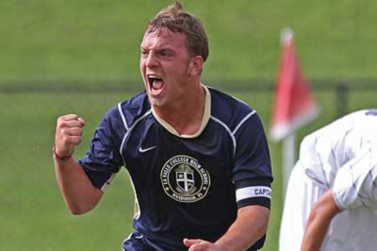 La Salle's Chris Pawlowski reacts after scoring against Rustin in the first half. (Michael Bryant/Staff photographer)