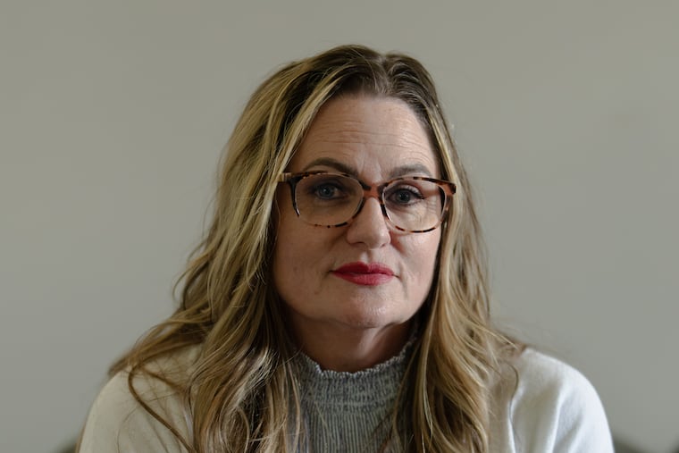Marci Bakely poses for a portrait at her home in Jefferson, Georgia. The 50-year-old single mom was being stalked by her former boyfriend who also happened to be police chief of a small town in the Atlanta suburbs.