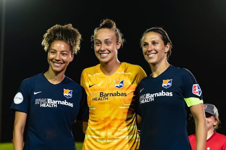 Estelle Johnson (left), Kailen Sheridan (middle) and Carli Lloyd were honored Wednesday by the Sky Blue for their World Cup participation.