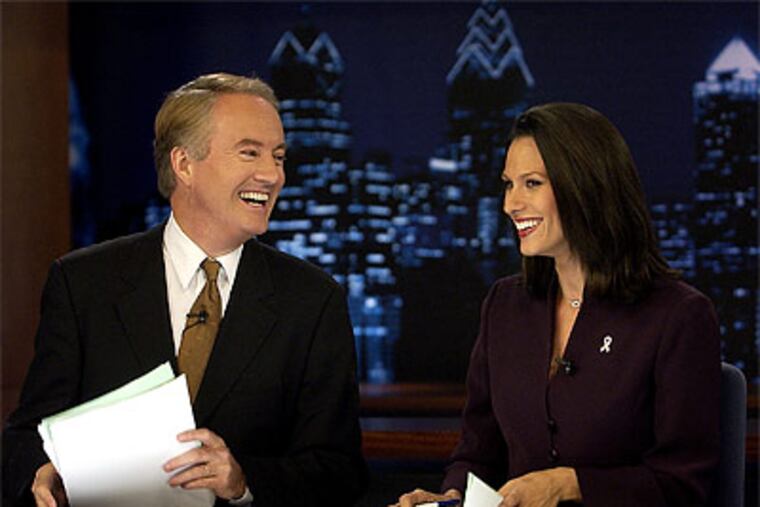 Former CBS3 anchor Larry Mendte, left, pleaded guilty to the federal felony of accessing a computer without authorization. (Peter Tobia/Staff file photo)