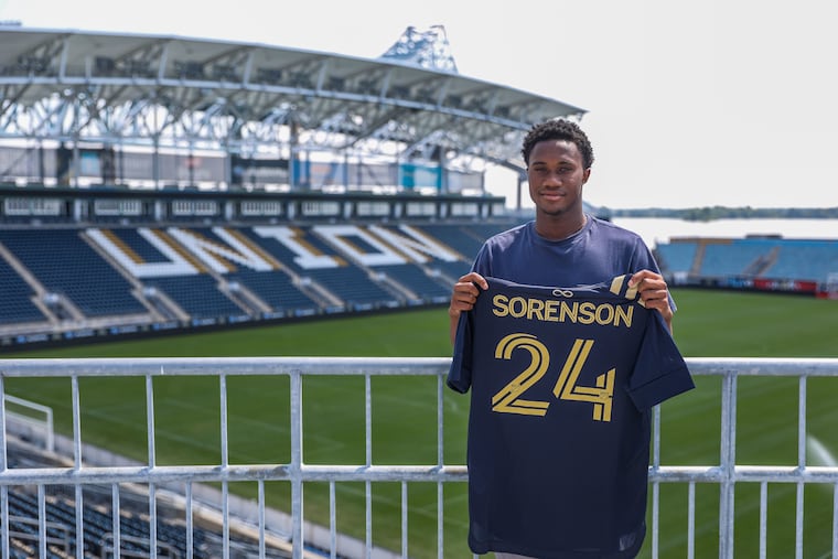 Anton Sorenson, a product of the team's youth academy, poses after signing his first Major League Soccer contract.