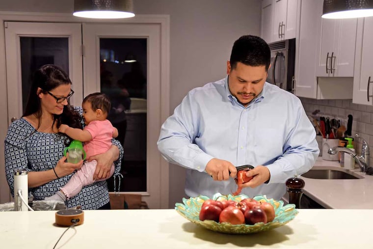 Jason Vargas prepares a pork dinner with wife Kathryn and daughter Madeleine using the Joule sous-vide device and Alexa’s voice technology.