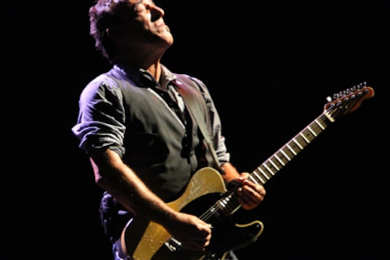 Bruce Springsteen plays an extended intro as he and the E Street Band perform "Prove It All Night" at at Citizen's Bank Park. This was his second night of performing there on Sept. 3, 2012. ( Charles Fox / Staff Photographer )