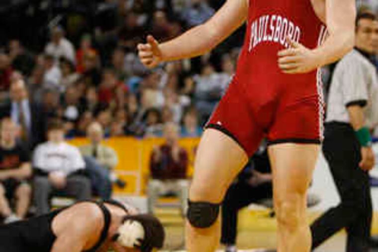 Zach Greenwald exults after bringing Paulsboro one of its two state titles on the day. Joe Duca won the other.